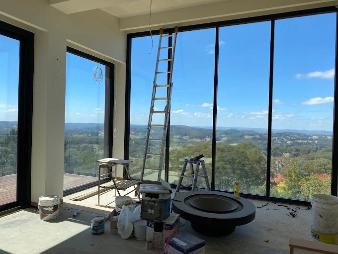 Floor-to-ceiling windows with Adelaide Hills views in a new home